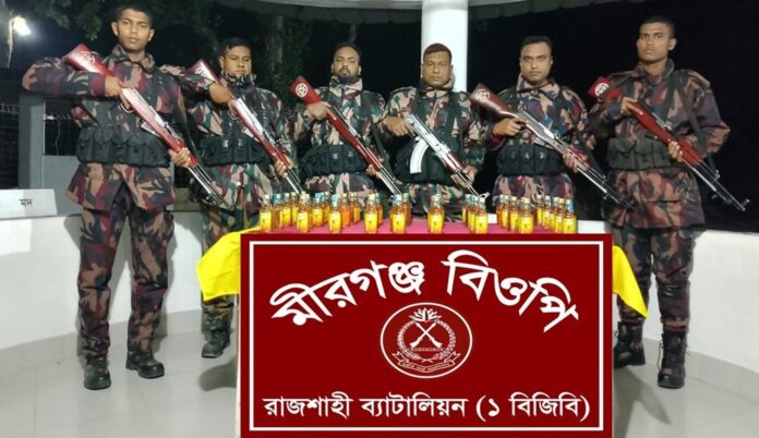 চারঘাটের নদীর চরে ভারতীয় মদ জব্দ