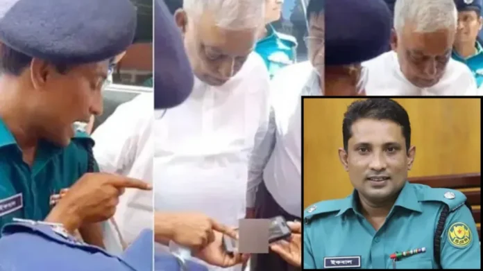 সাবেক স্বরাষ্ট্রমন্ত্রীকে গুলিতে হতাহতদের ভিডিও দেখাচ্ছেন সেই পুলিশ কর্মকর্তা। ছবির ইনসেটে ইকবাল হোসাইন